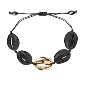 Boho Cowrie Bracelet

Matte Black edge